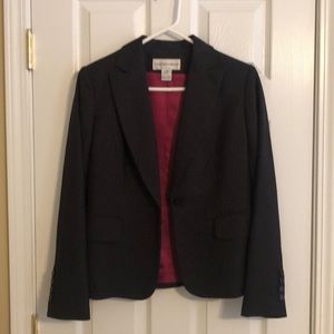 Black pinstriped pantsuit